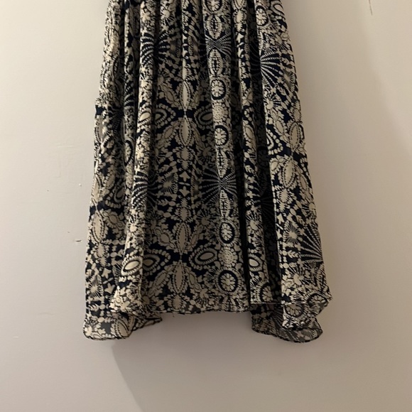 Beautiful low V Flowy Mini Dress - Picture 7 of 7